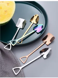 Cucharas creativas con forma de pala de acero inoxidable para postres, vista de detalle.