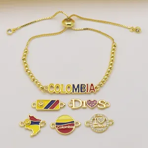 Verstellbares goldenes Armband mit Kolumbien und Mexiko Emaillier-Anhängern, schick.