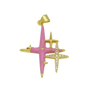 Close-up of the 18k gold plated starlight pendant featuring pink enamel and crystal details.
