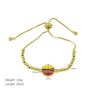 Goldfarbenes Schiebe-Kettenarmband mit runder Kolumbien-Flaggen-Emaille-Anhänger und verstellbar.