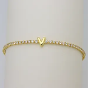 Gold-plated tennis bracelet with sparkling cubic zirconia and letter V charm for women