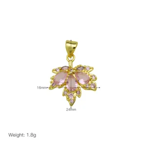 Detailed close-up view of elegant gold-plated pink zircon maple leaf pendant with dimensions.