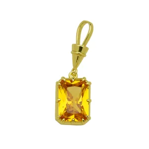 Exquisite yellow cubic zirconia gold plated pendant detail, elegant jewelry accessory.