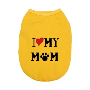 Yellow pet dog vest detail showing cute printed text pattern, comfortable cotton fabric daily wear.