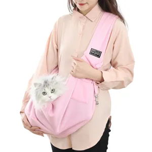 Detailed view of the pink pet sling bag, featuring soft fabric and adjustable strap for pets.