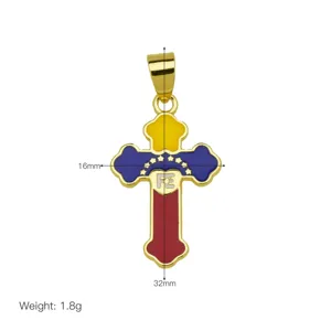 Close-up detail shot of a colorful enamel cross pendant, showing exquisite craftsmanship.