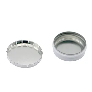 Round mini metal tin box detail showing silver interior and white outer side for small storage.