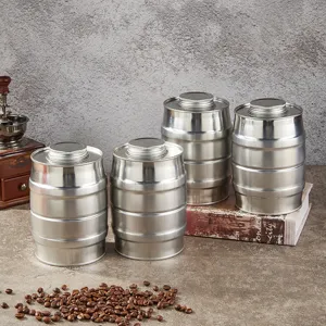Stainless steel barrel storage jar detail view, rustic coffee bean scene display setup.
