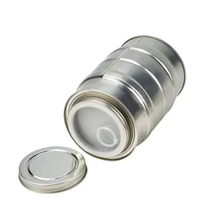 Detailed view of tinplate tea storage canister with pull-ring seal inner lid and metal cover.