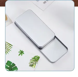 Silver sliding metal tin box close-up, minimalist storage container, smooth finish detail view.