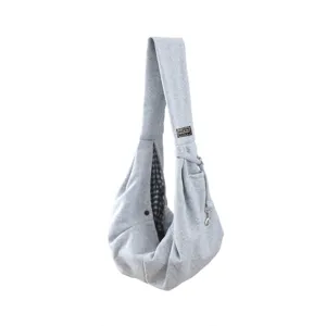 Portable grey pet sling carrier bag for cats and small dogs, comfortable cotton fabric lining.