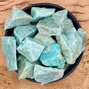 Rough amazonite crystal stones for home decor, natural mineral specimens for healing.