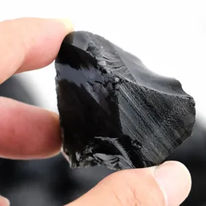 Natural obsidian crystal raw stone for aromatherapy diffuser and home fish tank decoration.