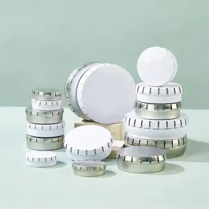 Round metal tin box detail showcasing various sizes for cosmetics, pills, and candy storage.
