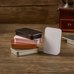 Pequeñas cajas de almacenamiento de metal portátiles con tapa para joyas y objetos pequeños.