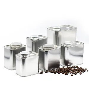 Silver metal coffee bean storage canisters with airtight screw lids and exhaust valves.
