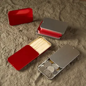Portable slider metal tin box for small items, pills, badges, and jewelry storage in detail.