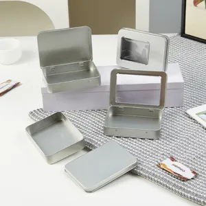 Silver rectangular metal tin box with window and solid lid, ideal for small items storage.