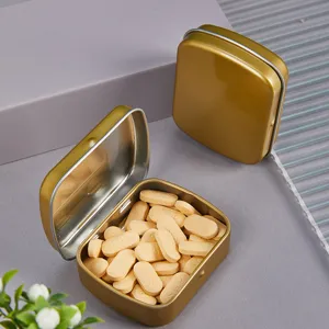 Petite boîte en métal dorée à couvercle rabattable pour bonbons, pilules et rangement.