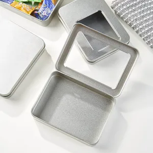 Silver rectangular metal tin box with clear window for storage, durable organizer case.