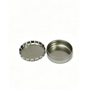 Mini round metal tin box storage container for mints, lip balm and small items detail view