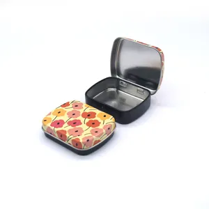 Boite en metal mini compacte avec motif floral, ideale pour ranger des bonbons et des comprimes.