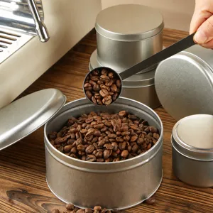 Round tinplate storage box with lid, metal silver finish, food grade container for coffee beans.