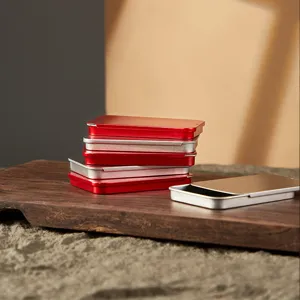 Portable metal sliding box for jewelry, pill, candy and small items storage, red and silver finish.