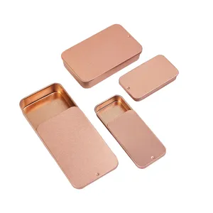 Boîte de rangement en métal or rose, conteneur coulissant pour bijoux, pilules et petits objets.