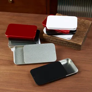 Portable sliding metal tin box for pills, candy, jewelry, and small items storage.