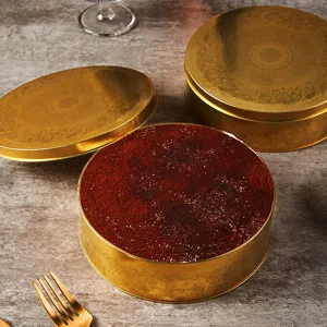 Boîte en métal ronde dorée avec motif floral gaufré pour gâteaux biscuits et rangement