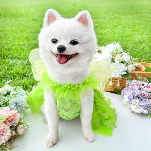 Cute green pet dress with lace and fairy wings for dogs and cats, perfect summer puppy apparel.