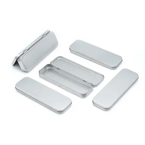 Detail view of portable rectangular metal tin storage box for DIY crafts and stationery items.