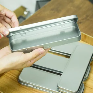 Portable flip top tinplate storage box, ideal for stationery, jewelry and makeup items.
