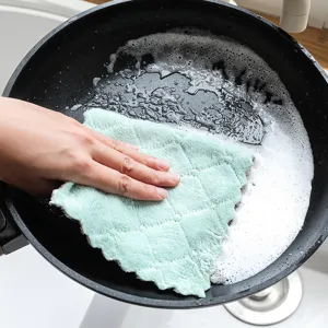 Double-sided coral fleece cleaning cloth for kitchen dishwashing and household wiping use.