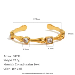 Detail showing 18K gold plated stainless steel cuff bracelet with zircon inlays