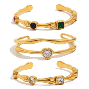 18K gold plated titanium steel open bangle with hammered texture and heart zircon