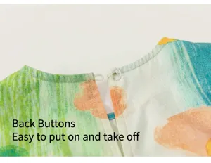 Close-up detail of the back button closure and soft fabric on the cute kids summer outfit.