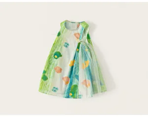 Close-up detail of green watercolor graffiti sleeveless children dress with mesh pleat accent.