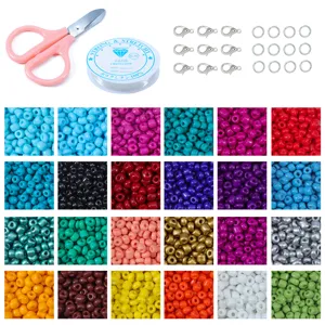 Kit de perles de rocailles DIY avec 24 couleurs vibrantes, fil élastique et accessoires.