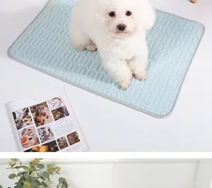 Detail view of summer pet cooling mat with geometric pattern and white dog model on top.