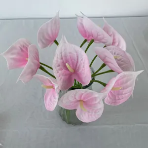 Artificial pink anthurium flowers bouquet in glass vase, realistic PU floral decor for home.
