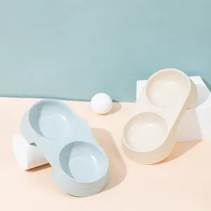 Macaron color pet double bowl for cats and dogs, dual feeding station with cute design.