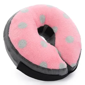 Pink polka dot plush pet recovery collar, soft Elizabethan cone for cat and dog safety care.