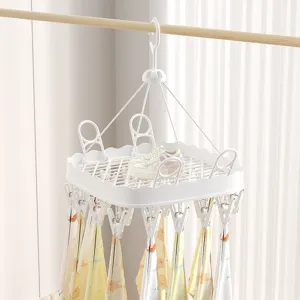 White multi-functional drying rack with clips and shoe drying tray for balcony use