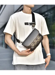 Detailed view of trendy men geometric pattern crossbody bag showing fine leather texture.