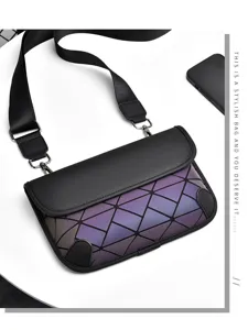 Geometric pattern messenger bag detail, black crossbody shoulder bag close-up view.