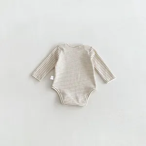 Infant baby long sleeve striped cotton bodysuit romper detail view, neutral background flat lay.