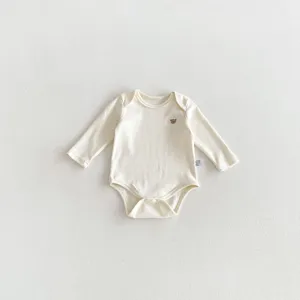 Infant pure cotton long sleeve bodysuit detail, cream baby romper with cute bear embroidery.