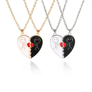 Cross-border fashion couple broken heart necklace with split black and white enamel pendants.